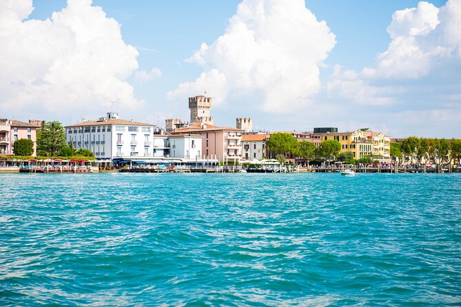 Boat Tour of the Islands of Lake Garda with Aperitif - Passing Gardone, San Marco Tower, and the best water-level photo angles