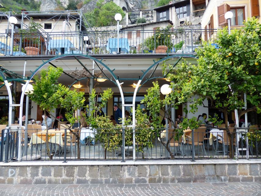 Full-Day Lake Garda Tour: Bus & Public Boat with Guide - Salò: a classic starting point for lakeside strolling