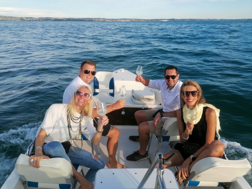 Garda: Private Boat Tour with Wine and Food Tasting - Entering the Lake With a Fishing Family Guide