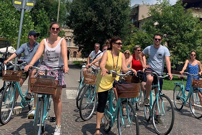 Highlights and hidden gems Verona Bike Tour - Porta Borsari and Piazza delle Erbe: Roman Walls Meet the Market Square