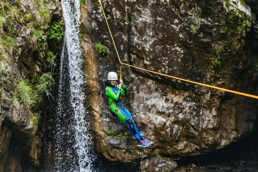Lake Garda: Family Friendly Canyoning Tour - Slides, swim stops, and optional deep-pool jumps