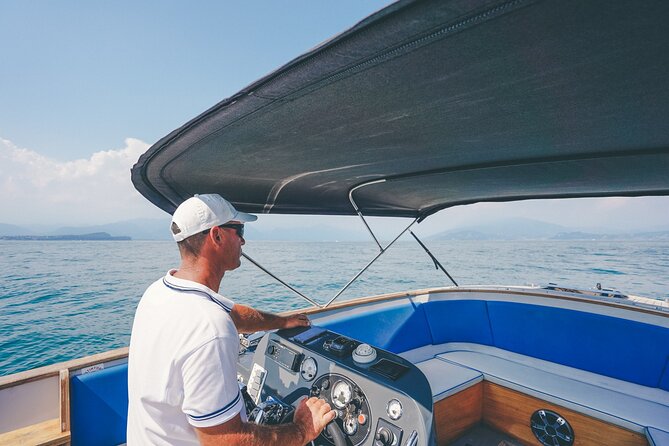 Lake Garda: Sirmione Boat Tour and Walking Tour - Sirmione on Foot: Medieval Streets, Castello Views, and Maria Callas