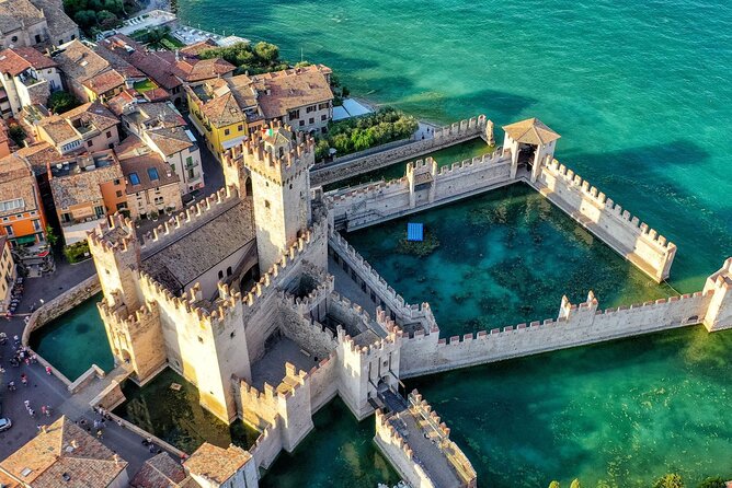 Lake Garda Tour aboard a Venetian Taxiboat - Isola del Garda: garden island energy and the neo-Gothic villa