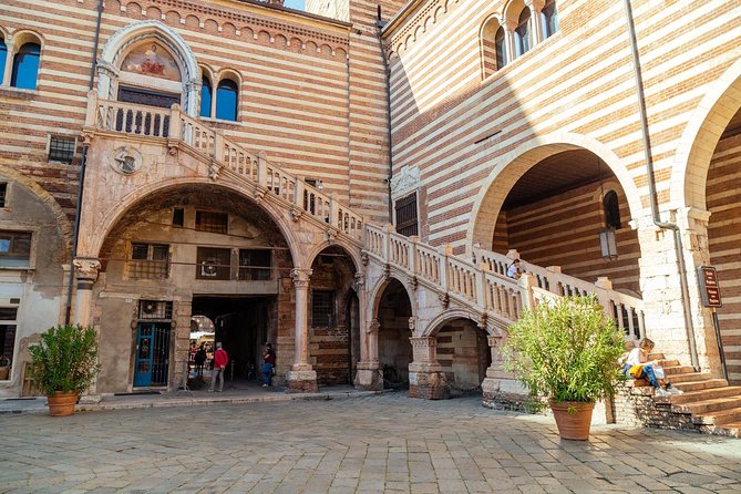 PRIVATE TOUR of Verona: Highlights & Hidden Gems With Locals & Snack Included - Arena di Verona: Roman amphitheater exteriors that still matter today