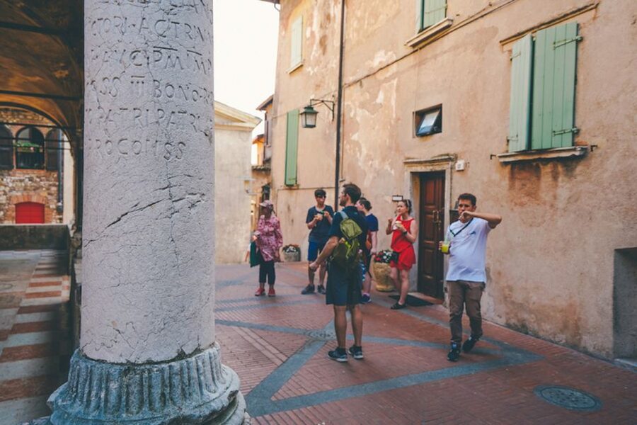 Sirmione: Lake Garda Boat, Grotte di Catullo & Walking Tour - Walking Sirmione’s alleys: thermal-bath area vibes and free time