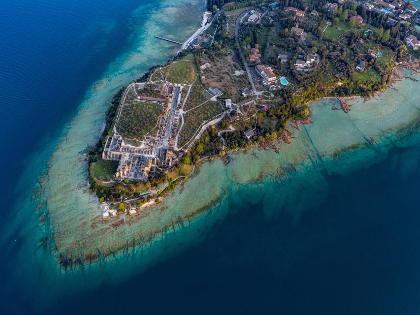 Sirmione: Scenic Afternoon Boat Cruise with Prosecco & Snack - Swim stop on a private island: when the lake becomes part of the plan