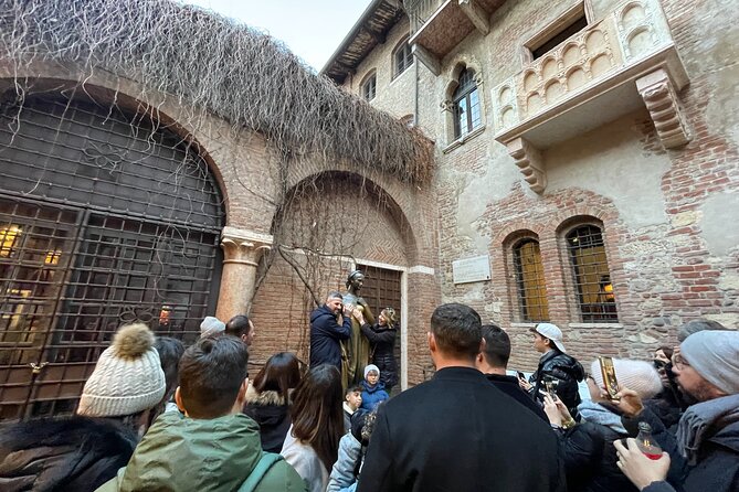 Verona: City Walking Tour with Cable Car Ride & Wine Aperitif - Erbe Square: local life energy before the aperitif