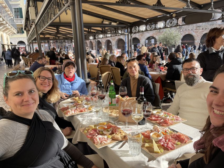 Verona: City Walking Tour with Cable Car & Wine Aperitif - Piazza Bra start: Arena views before the tour really begins
