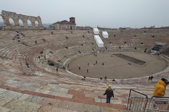 Verona Small Group Walking Tour with Cable Car and Arena Tickets - Piazza dei Signori: politics, Dante, and the people behind the stones