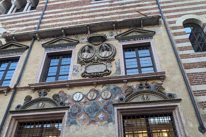 Walking Tour in Verona: 9+ Landmarks with Live Guide - The Historic Staircase and Piazza dei Signori: Where Social Lines Show