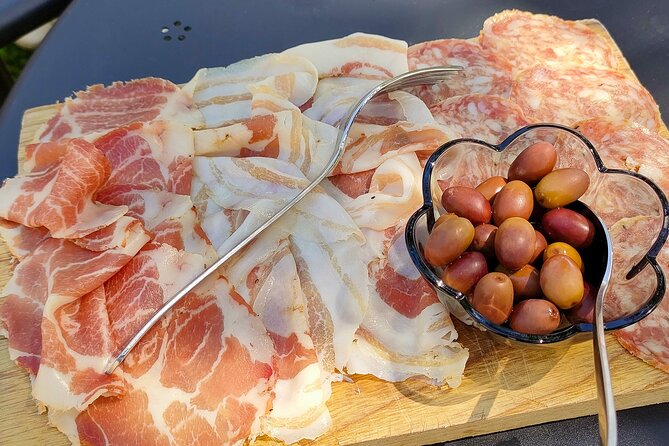 Wine Tasting with Local Food in Lazise Countryside - Outdoors under trees, or indoors when the weather changes